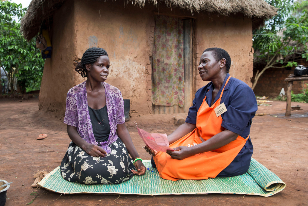 Midwife counselling woman