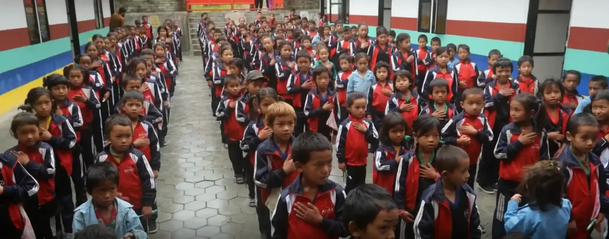 School kids in uniform at morning assembly.