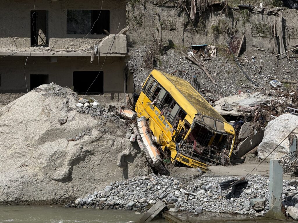 Nepal floods - Bagmati. Crashed yellow school bus