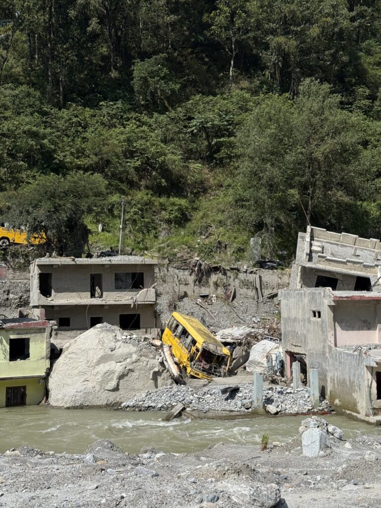 Nepal floods - Bagmati. Crashed yellow school bus